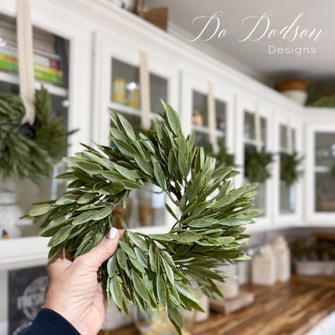 How To Hang Wreaths On Kitchen Cabinets Pantry Door Wreath Ideas, Kitchen Hood Wreath, Hanging Small Wreaths On Cabinets, Christmas Wreath On Cabinet Door, Plants On Kitchen Cabinets, Wreath On Range Hood, Kitchen Cabinet Wreath, Wreaths On Kitchen Cabinet Doors, Christmas Bows On Cabinets