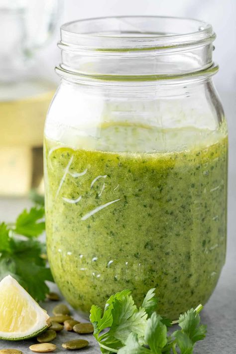 This pumpkin seed Cilantro Pesto sauce recipe is made with fresh cilantro, Parmesan cheese, extra-virgin olive oil, garlic and pepitas. Kamado Grill Recipes, Cilantro Garlic Sauce, Pesto Sauce Recipe, Pesto Potatoes, Cilantro Pesto, Delicious Salad Dressings, Arugula Pesto, Kamado Grill, Olive Oil Garlic