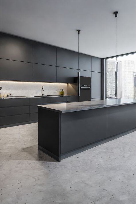 Black Kitchen Concrete Floor, Black And Concrete Kitchen, Kitchen Soft Aesthetic, Modern Kitchen Concrete Floor, Kitchens With Concrete Floors, Dark Minimalist Kitchen, Dark Island Countertop, Backlit Shelving, Christmas Guest Bathroom