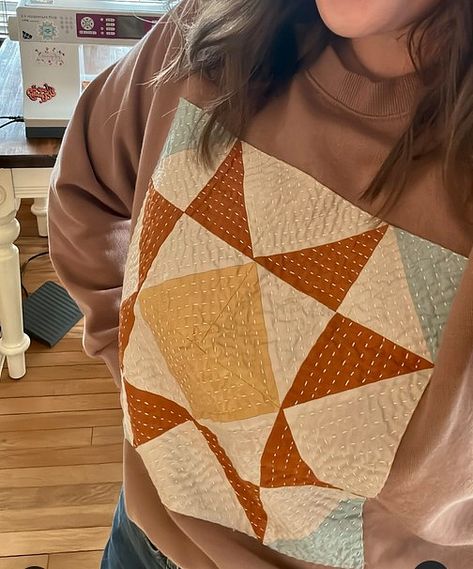 Dress Up a Sweatshirt with a Quilt Block - Quilting Digest Quilt Sweater Pattern, Quilt Block Sweatshirt Diy, Sweatshirt Quilt How To Make A, Sweatshirt With Quilt Block, Quilted Pullover Pattern, Quilted Sweatshirt Jacket Tutorial, Quilt Block On Sweatshirt, Quilted Sweatshirt Diy, Quilt Patch Sweatshirt