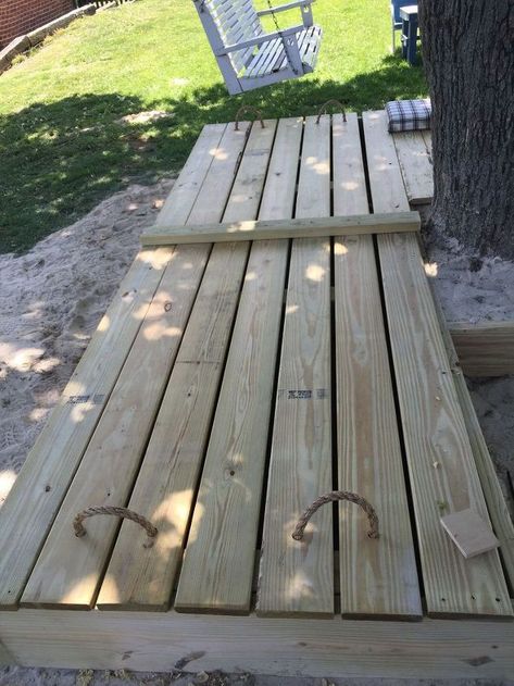 I was sick of the cats and chickens using the kid's sandbox as their own personal litter box so a covered sandbox was in the works. Until an idea came about to make a part of the sandbox a solid playdeck for the kid's chairs and table. And all of this built around a tree to save space! Playdeck, sandbox, and a toy storage area in one place. This is built from pressure treated lumber - 2X8s, 2X6s, 2X4s, and decking lumber. The 10X10 frame is built similar to a deck with supporting lu… Diy Outdoor Living, Sandbox Ideas, Sandbox Cover, Wooden Sandbox, Diy Sandbox, Backyard Plans, Cat Playground Outdoor, Kids Sandbox, Townhouse Garden