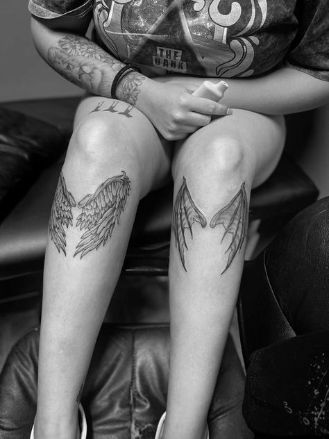 Angel wing Devil wing Bat wing Knee tattoos Angel Wings Below Knee Tattoo, Angel And Bat Wing Tattoo, Bat Wings Under Knee Tattoo, Bat And Angel Wing Tattoo, Angel Wings Under Knee Tattoo, Bat Wing Tattoo Knee, Bat Wing Tattoo Designs, Wings On Knee Tattoo, Patchwork Knee Tattoo