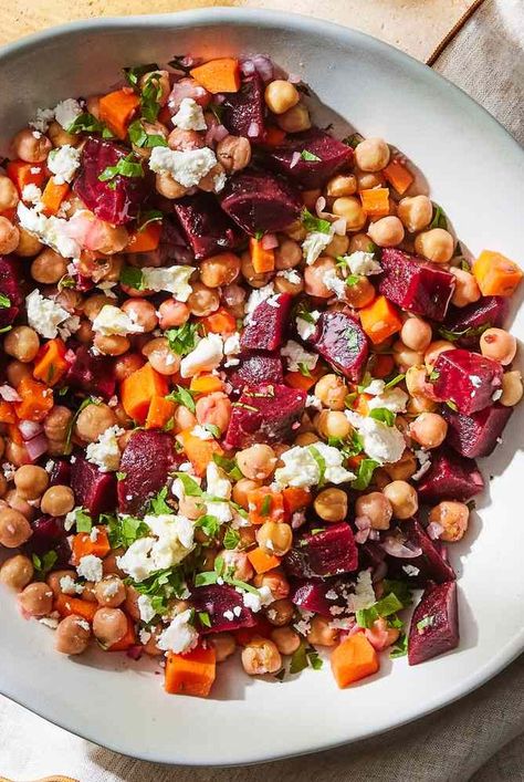 This chickpea, beet & feta salad is a vibrant blend of flavors and textures, marrying the earthy sweetness of beets with the creamy richness of feta cheese, all tied together with a zesty lemon-garlic dressing Weight Watchers Side Dishes, Beet Feta Salad, Girlfriend Dinner, Bean Salad Recipes Healthy, Gina Livy, Bean Salad Healthy, Garlic Vinaigrette, Bean Dishes, Healthy Beans