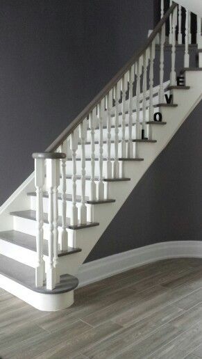 Grey Staircase. Red oak stained grey. White spindles grey stair treds. #greystairs #staircase #grey: Grey Staircase, Gray Stairs, White Staircase, Painted Staircases, White Stairs, Stair Makeover, Hallway Flooring, Staircase Remodel, Staircase Wall