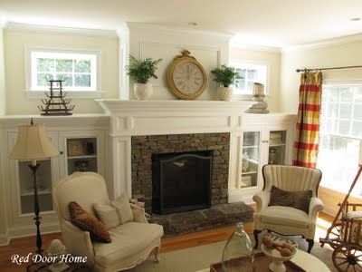 Built in cabinets flanking fireplace. I like the scale of these built ins. They flank the fireplace but don't over power it. Built In Around Fireplace, Deco Champetre, Built In Cabinet, Fireplace Built Ins, Family Room Fireplace, Farmhouse Fireplace, Fireplace Remodel, Built In Cabinets, Red Door