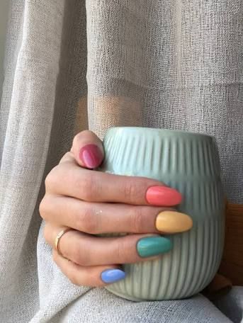 14 Easy Nail Art Designs You Can Definitely Do at Home — See Photos, Product Recommendations | Allure Fun Multicolor Nails, Fall Rainbow Nail Colors, Three Colour Nails, Multi Colored Ombre Nails, Colorful Nail Polish, Pastel Multicoloured Nails, Matte Rainbow Nails, Muted Rainbow Nails, Cute Nail Color Combos