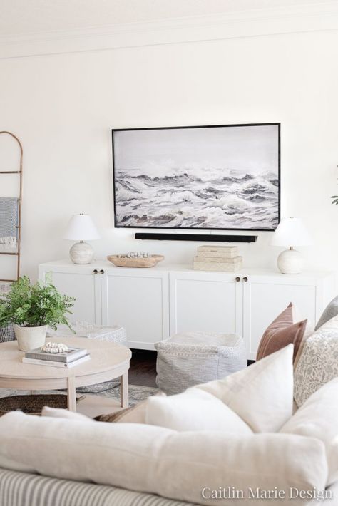 Simple TV Wall Decor (Living Room Update) - Caitlin Marie Design Tv Wall Farmhouse Decor, Coastal Tv Stand Decor, Tv Wall Modern Farmhouse, Tv Stand Styling Modern, Blanket Ladder Next To Tv, Wall With Tv Ideas, Smart Tv Wall Design, Modern Farmhouse Tv Wall, Tv Stand In Living Room