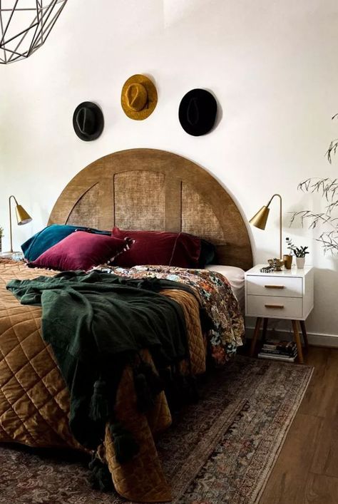 A geometric, vintage-inspired homemade headboard adds warmth and comfort to your sleep space. Not too confident with your power tool skills? Research your options thoroughly before purchasing (or renting) any tools, then finish the piece with a medium wood stain. #diybedroomheadboardideas #diybedroomdecor #apartmentdecoratingonabudget #smallspacedecorating #thespruce Retro Headboards, Arched Bed Frame, Half Circle Headboard, Moody Boho Bedroom, Round Headboard, Arch Headboard, Homemade Headboards, Painted Headboard, Diy Tufted Headboard