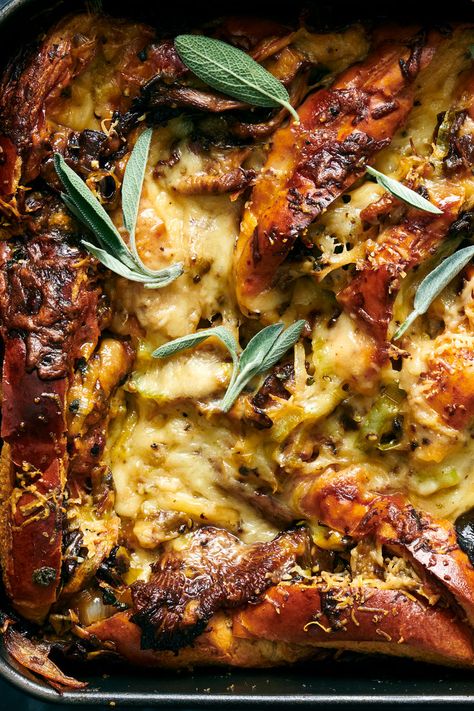 Mushroom Bread Pudding Recipe - NYT Cooking Thanksgiving Recipes Potluck, Herby Bread, Thanksgiving Bonfire, Butter Stuffing, Fall Potluck Ideas, Mushroom Bread Pudding, Mushroom Bread, Tomato Confit, Christmas Potluck