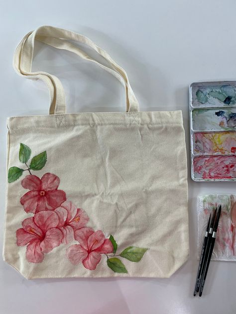 Hand painted with watercolors and sealed with a clear enamel spray. The canvas tote bag measures 15.7"W x 14.9"H, with an inner pocket size of 7.8"W x 7.8"H. Both the main body and inner pocket of the tote bag feature high-quality zippers, providing added storage and security. Canvas Bag Art Ideas, Fabric Paint Tote Bags, Paint On Canvas Bag, Diy Bag Design Ideas, Bag Painting Design, Cute Tote Bag Painting Ideas, Canvas Bag Ideas, Tote Painting Ideas, Canvas Tote Bag Painting