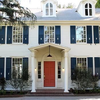 Coral Front Door Store Front Flower Pots, White House Navy Shutters, White House Blue Shutters, Coral Front Doors, Home Exterior Colors Schemes, White Colonial, Colonial House Exteriors, Shutter Colors, Home Exteriors