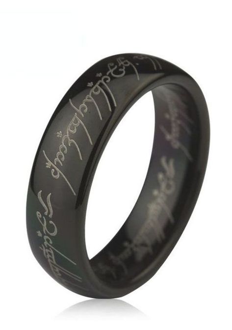 This lotr wedding band from our line of Comfort Fit tungsten carbide rings is in black color with a logo The Lord of The Ring laser engraved on the outside. This sleek style has a domed polished profile and comes 6mm and 8mm as well, for couples who prefer matching sets. This lotr the one ring can be worn as a Wedding Band or Promise Ring by men or women. Lotr Wedding Ring, Lotr Wedding, Lord Of The Ring, The One Ring, Mens Wedding Bands Tungsten, Matching Wedding Rings, Black Wedding Band, Meteorite Ring, Rings Mens Wedding Bands