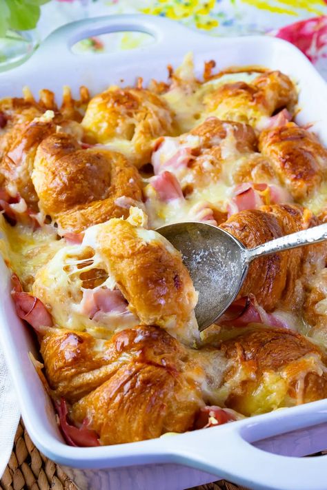 Buttery croissants, smokey ham, and gooey cheese are all baked together for the ultimate breakfast casserole. Inspired by the French classic, Croque Monsieur, this is an easy-to-make recipe that’s heavenly served with powdered sugar, jam and perfect for breakfast, brunch, and a must for the holidays. Breakfast Casserole With Croissants, Croissant Breakfast Casserole, Ham And Cheese Croissant, Best Breakfast Casserole, Croissant Breakfast, Ultimate Breakfast, Breakfast Casseroles, What's For Breakfast, Recipes Casserole