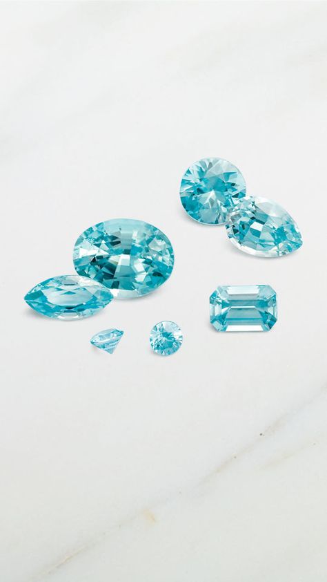 Blue zircon combines a gorgeous teal color with fiery brilliance akin to diamonds. In fact, for centuries, people confused colorless zircon with diamond. 💙💎  Learn more about blue zircon, one of December's three blue birthstones, on the blog today! Zircon Gemstone, Design Board, Colored Gems, Blue Gems, Gem Stones, Teal Color, Blue Zircon, Blue Gemstones, Teal Colors