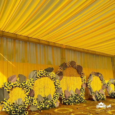 This intimate haldi ceremony decor showcased the timeless beauty of marigold & sunflowers, creating a vibrant and festive backdrop for this joyous occasion. The rich, golden hues of the marigolds brought an air of warmth and celebration, perfectly capturing the essence of this traditional Indian ritual. Each carefully arranged flower not only added a touch of elegance but also embodied the blessings and love surrounding the couple. Our team meticulously crafted the decor to ensure every detai... Haldi Decorations, Festive Backdrop, Haldi Decor, Haldi Ceremony, Event Decoration, Indian Wedding Decorations, Ceremony Decor, Flower Backdrop, Diy Party Decorations