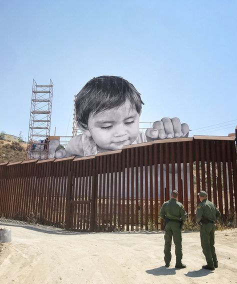 Artist JR’s Latest Large-Scale Installation on the U.S.-Mexico Border - BOOOOOOOM! - CREATE * INSPIRE * COMMUNITY * ART * DESIGN * MUSIC * FILM * PHOTO * PROJECTS Us Mexico Border Wall, Mexican Side, Mexico Border, Mexican Border, Protest Art, Border Wall, Colossal Art, The Resistance, Art Street