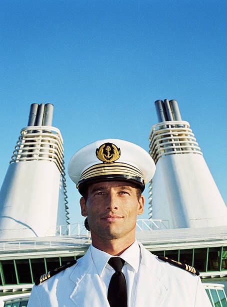 3,725 Boat Captain Photos and Premium High Res Pictures - Getty Images Boat Captain Hat, Pastel, Boat Captain Aesthetic, Seaman Picture, Captain Of The Ship, Marina Wedding, Ship Captain, Cruise Party, Blue Lovk