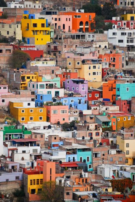 It makes sense that this city is filled with many artists since just about every house sports a different color. Visitors can take a cable car up and down the hill to take in the views without working up a sweat. Spanish Towns, Colourful Buildings, Visit Mexico, Mexico Travel, Oh The Places Youll Go, City Art, World Heritage Sites, House Colors, Cityscape