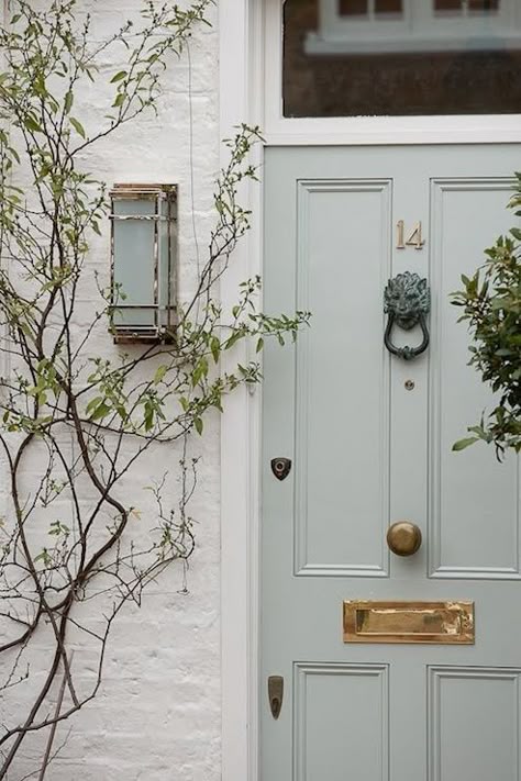 Pale blue door with brass numbers & hardware Blue Gray Shutters White House, Greenish Gray Exterior House Colors, Sage Green Shutters White House, Sage Door, Painted Brick Exterior, Transitional Home Exterior, Mint Door, Grey Front Door, Color Door