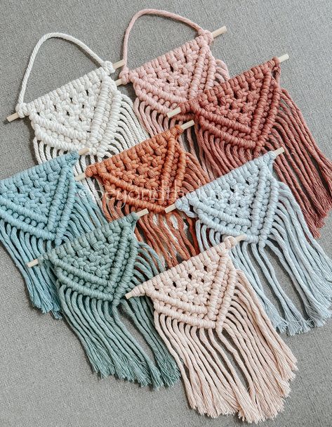 These mini macrame wall hangings are a perfect way to add a little boho touch to your home, office or anywhere! 》Made from 100% recycled cotton 》Colors may vary due to different screens and settings. 》Please note that this is a handmade item and may vary slightly in size and appearance All items are handmade with a lot of time, energy, and most importantly love. Macrame Mini Wall Hanging, Small Macrame Projects, Macrame School, Macrame Gift, Mini Macrame Wall Hanging, Macrame Style, Small Macrame Wall Hanging, Macrame Wall Hangings, Christmas Craft Fair