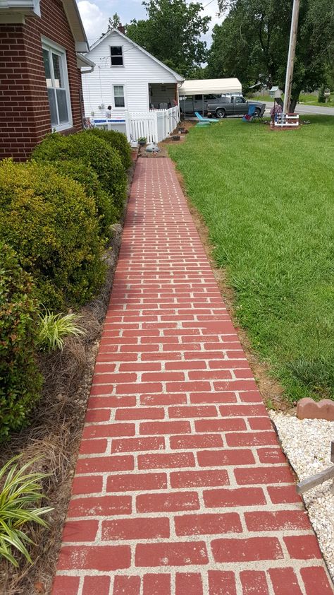 Faux brick on concrete.  We used Bher     concrete with half epoxy paint mixed in brick red. We used a mop sponge to make it match the original brick on the house. Brick Sidewalk, Cottage Patio, Brick Porch, Concrete Patio Makeover, Porch Styles, Side Walk, Backyard Walkway, Concrete Patio Designs, Side Yard Landscaping