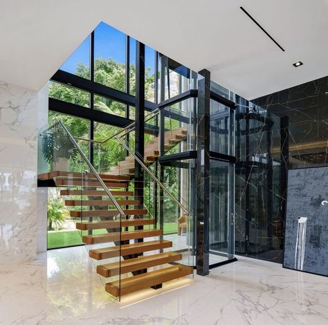 Villa Elevator Interior Design, Staircase Around Lift, Stairs With Elevator Design, Stairs And Elevator Design, Stairs And Elevator, Villa Elevator, Luxury Staircase, Elevator Interior, House Architecture Styles