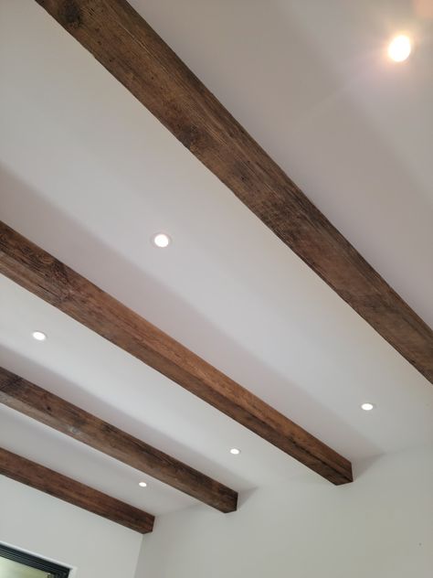 Low Ceiling Wood Beams, Wood Beam On Ceiling, Add Wood Beams To Ceiling, Wood Beams Tray Ceiling, Wood Beams Bedroom Ceilings, Exposed Beams Low Ceiling, Wooden Ceiling Beams Living Rooms, Decorative Beams Ceiling, Wrapped Beams