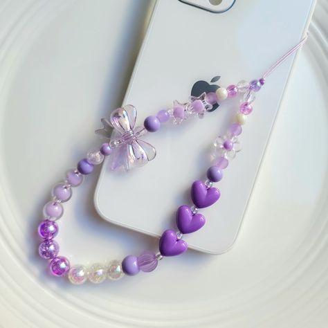 Buy Purple Heart Beaded Phone Strapcute Phone Charmphone online on Etsy India. Shop for handmade, vintage and unique Mobile Phone Plugs & Charms items from IamKeeyomee online on Etsy Phone Handle Beads, Purple Phone Strap, Diy Phone Accessories, Purple Phone Charm, Beaded Phone Strap, Number Beads, Charm Phone, Strap Phone, Bead Charms Diy