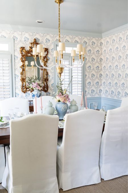 Dining room chairs and decor sourced here! Wallpaper gold mirror chandelier home decor grandmillennial style southern home #LTKhome Small Dining Room Wallpaper, Dining Room Grand Millennial, Grandmillennial Dining Room, Blue Dining Room Wallpaper, Grand Millennial Chandelier, Grandmillenial Kitchen Wall Decor, Grandmillennial Kitchen, Grandmillenial Dining Room Chandelier, Preppy Dining Room