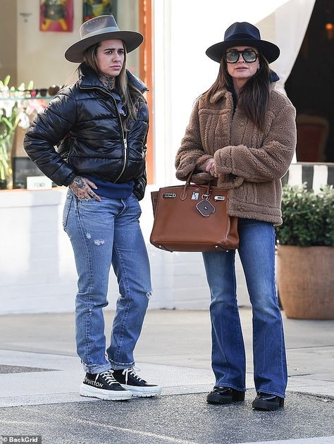 Kyle Richards further fueled rumors of a romance with Morgan Wade after being spotted with the country music star on a lunch date alongside Kyle's sister Kathy Hilton Kyle Richards House Interior, Kyle Richards Style, Kyle Richards House, Morgan Wade, Louis Vuitton High Tops, Kathy Hilton, Kyle Richards, Lunch Date, Black Puffer Jacket