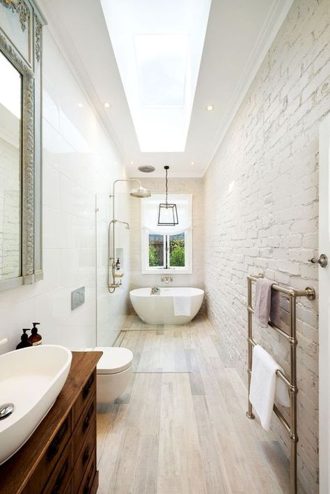 Narrow Bathroom With Accent Brick Wall #bathroom #narrow #narrowbathroom #decorhomeideas Narrow Bathroom Layout, Small Narrow Bathroom, Long Narrow Bathroom, Narrow Bathroom Designs, Bathroom Layout Ideas, Small Bathroom Layout, Bathroom Layouts, Narrow Bathroom, Bathroom Floor Plans