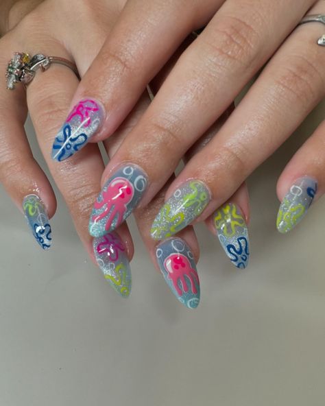 Jellyfish 🪼 Who lives in a pineapple under the sea? #nailtech #nailsnailsnails #sacramentogelx #spongebob #naildesign #nailaddict Spongebob Nails Designs, Sponge Bob Nails, Spongebob Nail Art, Jellyfish Nails, Spongebob Nails, Fish Nails, Sea Nails, Pineapple Under The Sea, Hard Nails