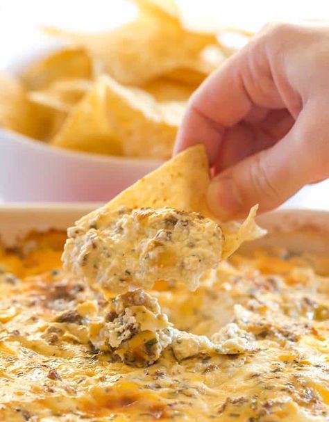 This "Hissy Fit Dip" with the crazy moniker is a HUGE party hit - sausage, cream cheese, sour cream, two cheeses, chives and seasonings make this one absolutely irresistible! | browneyedbaker.com Baby Girl Shower Food Ideas, Hissy Fit Dip, Shower Food Ideas, Brown Eyed Baker, Hissy Fit, Shower Food, Baby Shower Food, Appetizer Dips