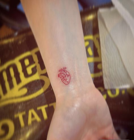 Wrist Tattoos Heart, Heart On Wrist Tattoo, Red Wrist Tattoo, Heart On Your Sleeve Tattoo, Heart Small Tattoo, Small Tattoo Heart, Heart On My Sleeve Tattoo, Heart On Sleeve Tattoo, Heart Wrist Tattoo