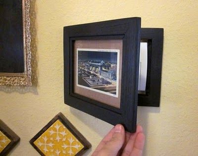 How to hide your home alarm... you know, the one that doesn't match any of your decor.  DIY home decor Thermostat Frame, Hide Thermostat, Hinged Picture Frame, Thermostat Cover, House Security, Bungalow Interior, Home Alarm, Art Frames, Big House