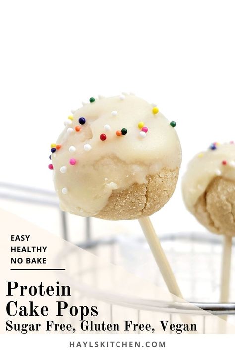 Kinda pretty but still healthy Protein Cake Pops made with just 4 ingredients, and no bake too! These low calorie high protein cake bites are Vegan, gluten free and sugar free; A great birthday cake protein snack or dessert recipe. Herbalife Protein Cake Pops, Herbalife Cake Pops Recipe, Protein Cake Balls, High Protein Cake, Vanilla Protein Cake, Protein Powder Cake, Protein Cake Pops, Healthy Cake Pops, Food Polls