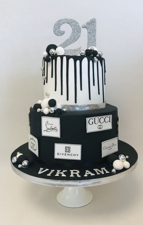 2 tier 21st Birthday cake in monochome black and white with a touch of silver including favourite designer logos Pastel, Cake Black And White Birthday, Black And Silver 21st Birthday Cake, Black And White 21st Cake, Black White And Silver Birthday Cake, 21st Birthday Cake 2 Tier, Birthday Cake Black And Silver, Black And Silver Cake For Men, 2 Tier 21st Birthday Cake