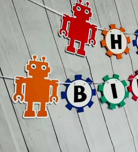 Rebecca Ann Designs Robot Birthday Banner is Amazing! This Robot Themed Birthday Banner is perfect for your little ones birthday Party Decor. Banner is colorful with Robots at the ends Name and or Age can be added at checkout. Click here for more Robot Party Decor: https://etsy.me/3W9bqm0 Robot Party Decorations, Robot Party Ideas, Robot Themed Birthday Party, Robots Party Theme, Robot Birthday Party Decorations, Robot Birthday Party, Robot Theme, Robot Party, Cricut Birthday