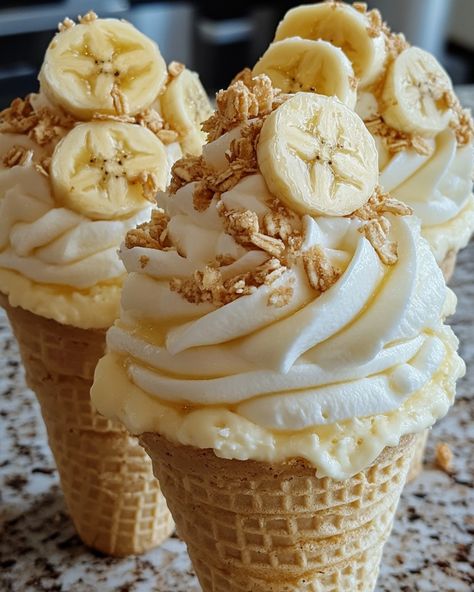 🍌 Banana Pudding Cheesecake Cones 🍌 These Banana Pudding Cheesecake Cones are a fun twist on a classic dessert. With creamy banana pudding cheesecake filling inside a crispy cone, they're perfect for parties or an indulgent treat! Ingredients: 1 package (8 oz) cream cheese, softened 1 box (3.4 oz) instant banana pudding mix 1 ½ cups cold milk 1 cup powdered sugar 1 teaspoon vanilla extract 1 cup whipped cream or whipped topping 6-8 waffle cones 1 cup crushed vanilla wafers Banana slices (f... Banana And Whipped Cream, Banana Pudding Waffle Bowl, Banana Pudding Cheesecake Cones, Waffle Cone Desserts, Cheesecake Cones, Creamy Banana Pudding, Instant Banana Pudding, Pudding Cheesecake, Banana Pudding Cheesecake