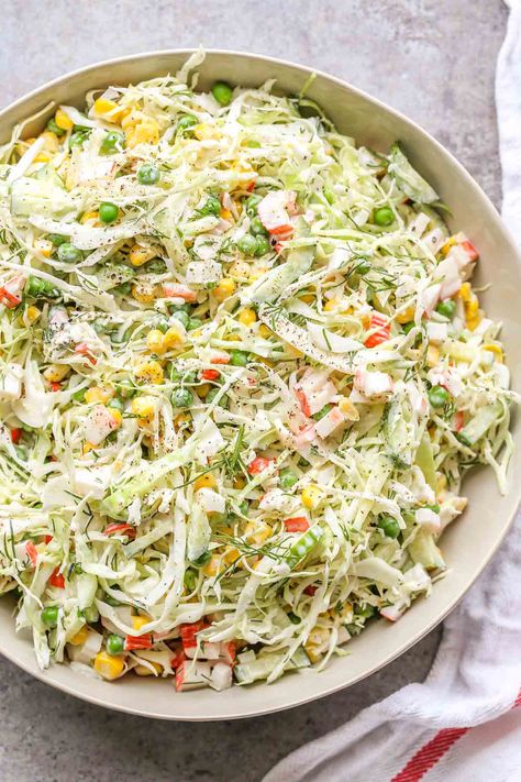 Cabbage crab salad recipe. This salad is quick, simple, and delicious. A mixture of cabbage, cucumbers, meat, peas, and corn topped with a mayo dressing. Crab And Asparagus, Salad With Mayonnaise, Creamy Cabbage, Cabbage Salad Recipe, Crab Salad Recipe, Cabbage Salad Recipes, Turkey Salad, Mayonnaise Recipe, Crunchy Salad