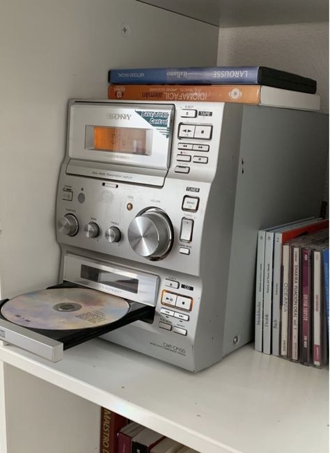 Polaroid Camera Photo Album, Cd Player Set Up, Music Cd Aesthetic, Cd Collection Aesthetic, Vintage Cd Player, Music Shelf, Nerdy Room, Room Gadgets, Music Bedroom