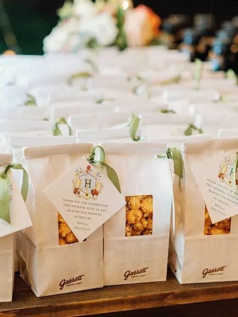 15 Cute Wedding Popcorn Bar Ideas + How To Set Them Up Wedding Favors Snacks, Wedding To Go Snacks, Wedding Favor Popcorn, About To Pop Popcorn Favors, Popcorn Wedding Favors For Guests, Wedding Popcorn Bar Ideas, Baby Shower Popcorn Favors, Wedding Favor Snacks, Popcorn Bar Ideas