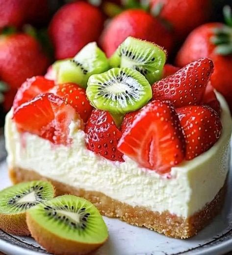 Chef Guy Fieri . Recipes 🍲 | 🍓 STRAWBERRY KIWI DREAM CHEESECAKE DELIGHT 🥝 | Facebook Guy Fieri Recipes, Lidia Bastianich Recipes, Cheesecake Delight, Recipes Strawberry, Lidia Bastianich, Strawberry Kiwi, Guy Fieri, Strawberry Desserts, Graham Cracker Crumbs