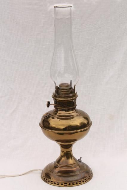 vintage brass lamp w/ glass chimney, old oil lamp converted to electric light Brass Oil Lamp, Antique Oil Lamps Vintage 19th Century, Electric Oil Lamp, Oil Lamp Converted To Electric, Antique Brass Lamp, Antique Oil Lamp Decor Ideas, Diy Lantern Lights, Oil Lamp Decor, Old Oil Lamp