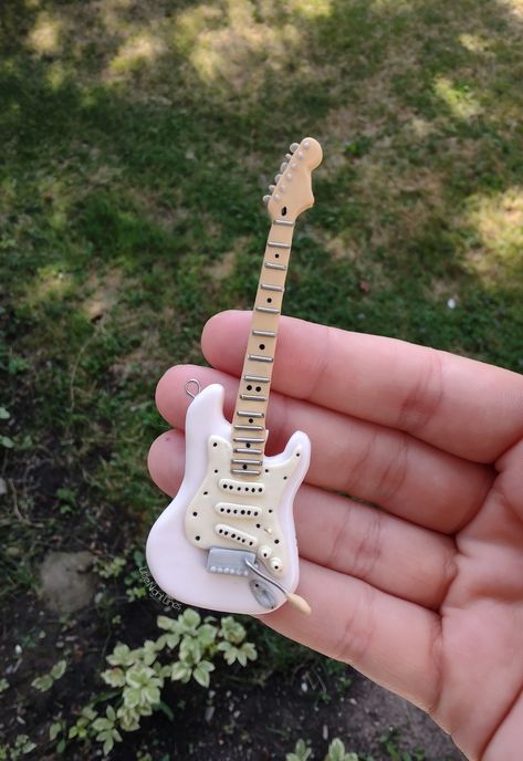 🎸 Made this custom guitar for a long time friend! For more custom designs and handcrafted items check out my shop LittleNightLines @ Etsy! Guitar Clay Art, Polymer Clay Guitar, Clay Guitar, Ceramic Guitar, Guitar Crafts, Clay Diy Projects, Long Time Friends, Custom Guitar, Clay Figures