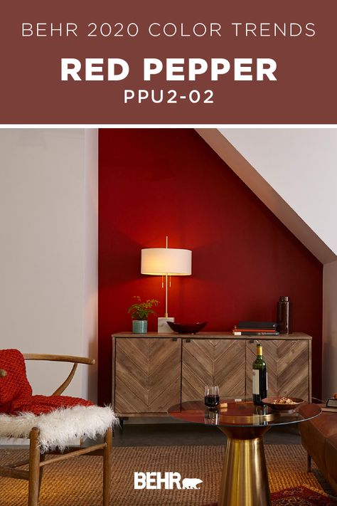 BEHR® Paint in Red Pepper, from the BEHR® 2020 Color Trends Palette, is a deep red that adds a dramatic accent to any wall or décor piece. Featured as a bold accent color in this modern living room, it brings a sense of vitality and life to this space. Click below for full color details to learn more about this shade. Behr Red Pepper, Exterior Behr, Paint Colors Behr, Red Living Room Walls, Red Accent Wall, Red Paint Colors, Wall Painting Living Room, Color Palette Living Room, Behr Paint Colors