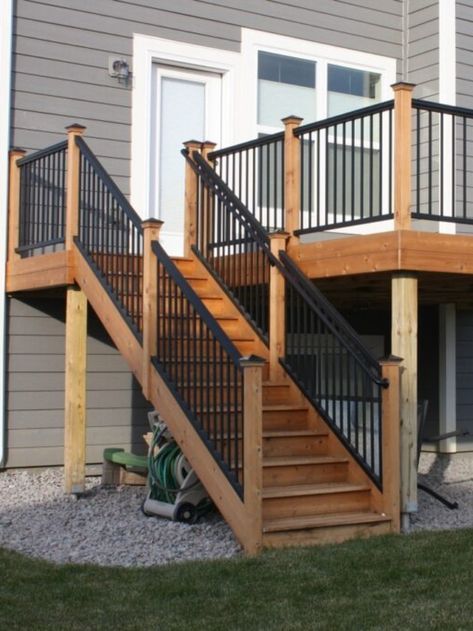 Wood Decks With Metal Railings, Wood And Rod Iron Railing Deck, Black Spindle Deck Railing, Patio Stairs Railing Ideas, Back Deck With Railing, Wood Deck Metal Railing, Outside Railing For Steps, Black Railing Stairs Outdoor, Metal Railings Outdoor Porch Ideas