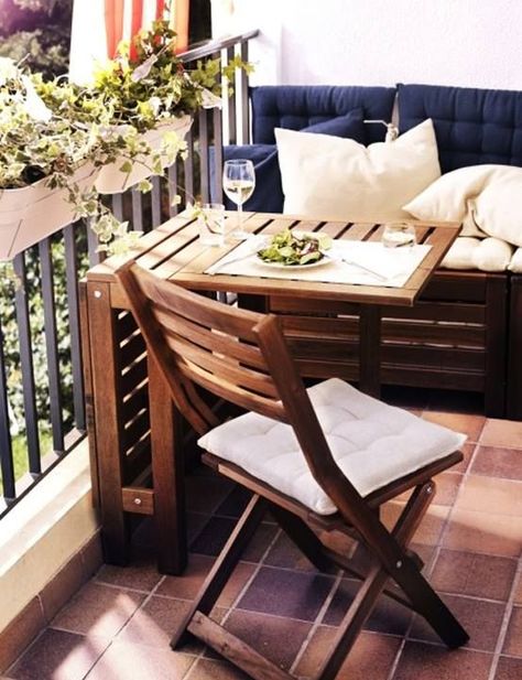 Place a small 2-seat cushioned bench against the end of the balcony with a small table, preferably round, for drinks/food/knitting. Opposite end can be filled with plants and flowers.                                                                                                                                                     More Balcon Mic, Balkon Decor, Tiny Balcony, Balcony Design Ideas, Small Balcony Design, Home Balcony, Apartment Patio, Balcony Furniture, Folding Furniture