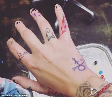 Paid tribute: She also got a tattoo of the iconic lightning bolt to represent the late David Bowie, and Prince's purple 'Love Symbol' to honour the legendary late musicians, as… Paris Jackson Tattoo, Michael Jackson Tattoo, Prince Jackson, Jackson Instagram, Prince Tattoos, Michael Jackson Bad, Bad Tattoos, Paris Jackson, Music Tattoos