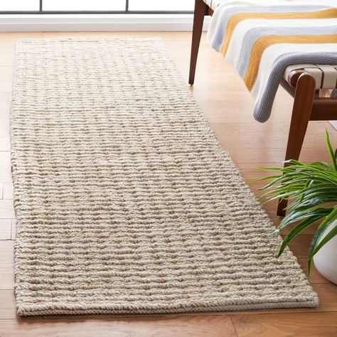 SAFAVIEH Handmade Ivory Jute Area Rug - Bed Bath & Beyond - 18731911 Grass Rug, Sisal Area Rugs, Natural Jute Rug, Floor Heating, Coastal Rugs, Solid Color Rug, Beach House Style, Jute Area Rugs, Rug Brown